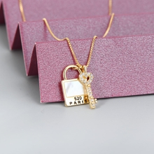 Show details for Featured White Key & Lock Pendant Necklace with Full Guarantee