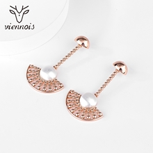 Show details for Nickel Free Gold Plated White Dangle Earrings with Easy Return