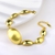 Picture of Low Price Zinc Alloy Gold Plated Fashion Bracelet in Exclusive Design