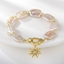 Show details for Filigree Small White Fashion Bracelet