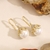 Picture of Eye-Catching White Flowers & Plants Earrings with Member Discount