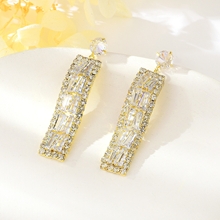 Show details for Trendy Gold Plated White Dangle Earrings with No-Risk Refund